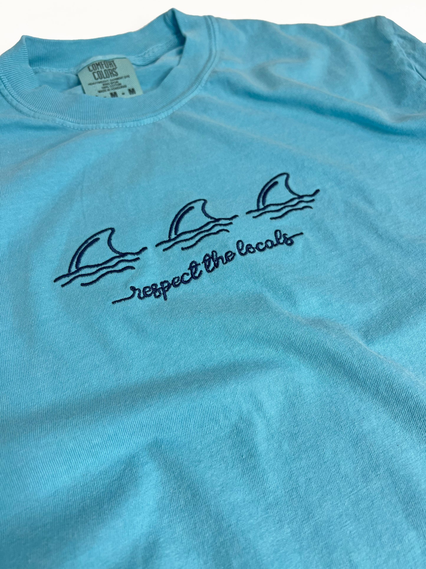 SHELLY COVE RESPECT THE LOCALS SHARKS, EMBROIDERED TEE